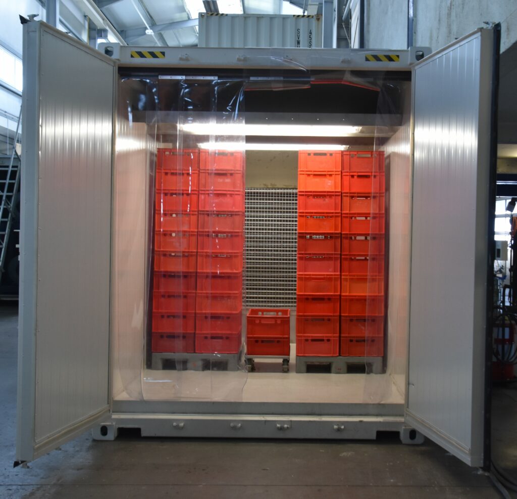 KTI Blast freezer with open door and view into the freezing chamber. Pallets with the products to be frozen are inserted before the freezing process starts.
