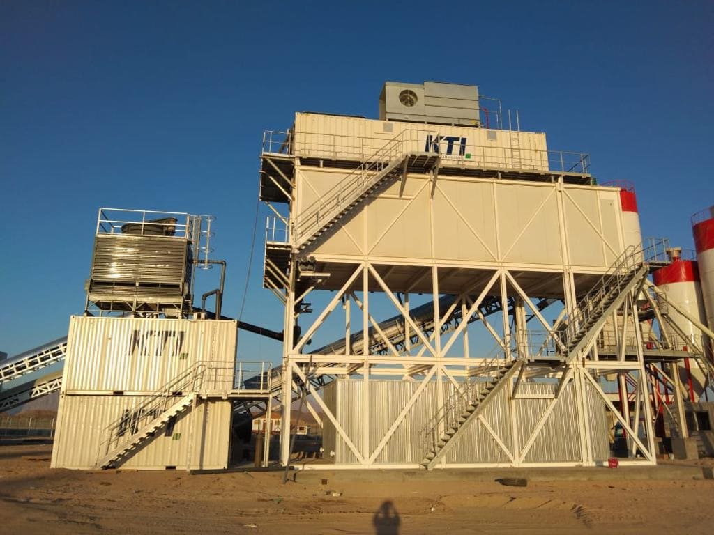 Two insulated water tanks for stocking cold water in a concrete cooling setup. One in the 20-foot container, the other integrated into the steel foundation.
