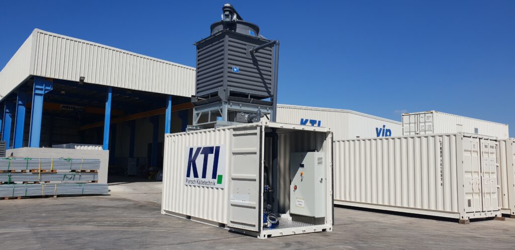 Compact ice water plant in container with cooling tower on the roof.