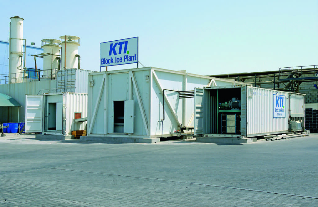Block ice plant (m) with block ice storage (l) and containerized refrigeration plant (r)